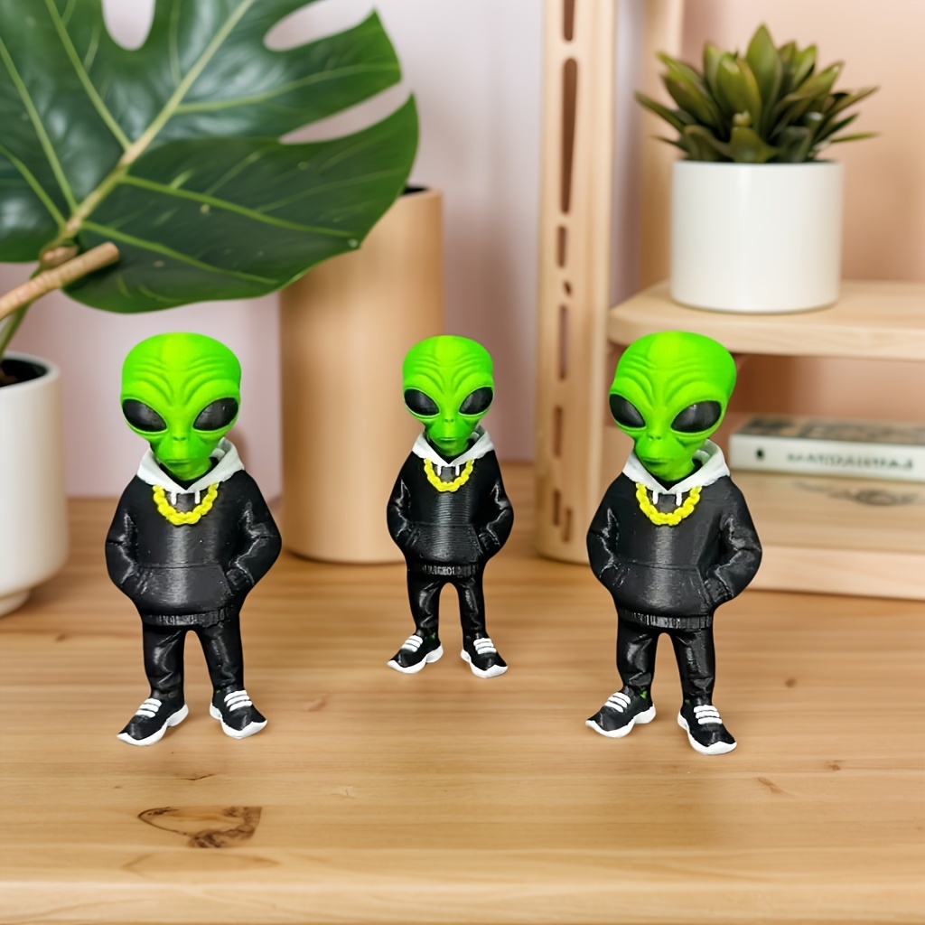 1 stuk groene alienfiguur met  - Office Furniture Brand recensie en prijs