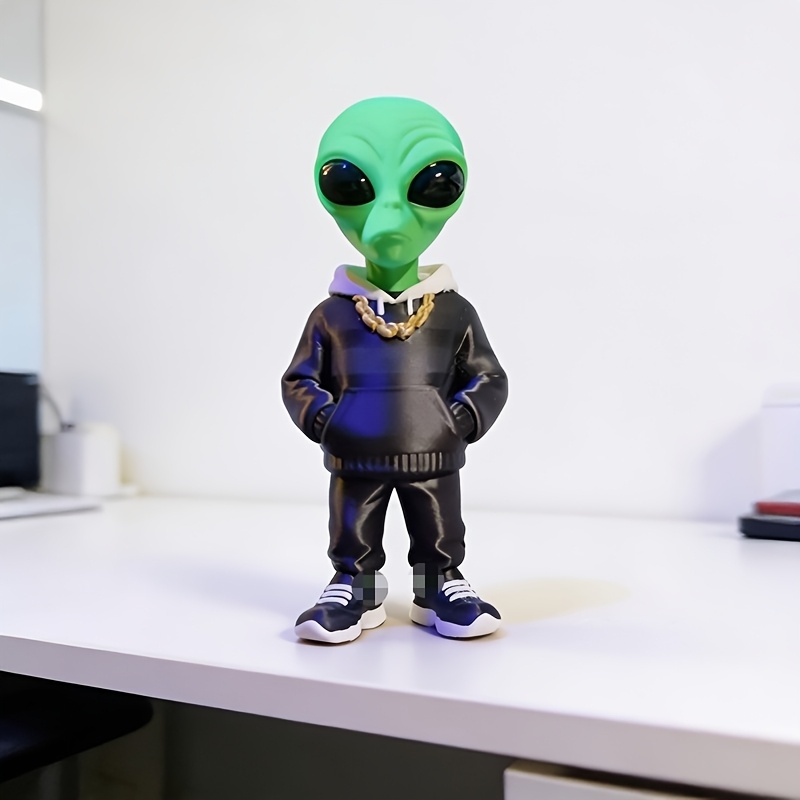1 stuk groene alienfiguur met  - Office Furniture Brand recensie en prijs